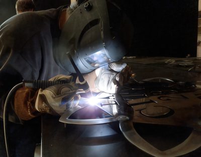 Tim TIG welding the LAPD Series 1 Badge.