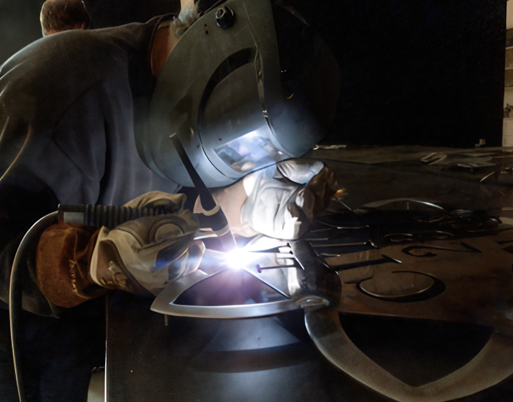 Tim TIG welding the LAPD Series 1 Badge.